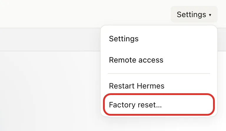The Settings menu open at the top right of the chat screen, with Factory reset… circled